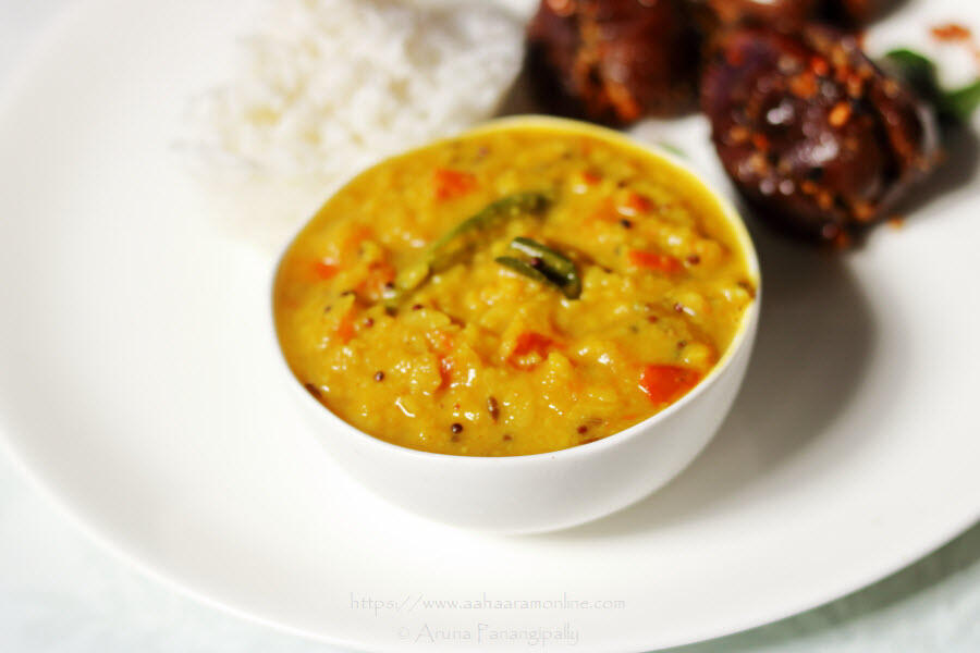Tomato Pappu, Andhra-style Tomato Dal, served with rice and stuffed brinjals 