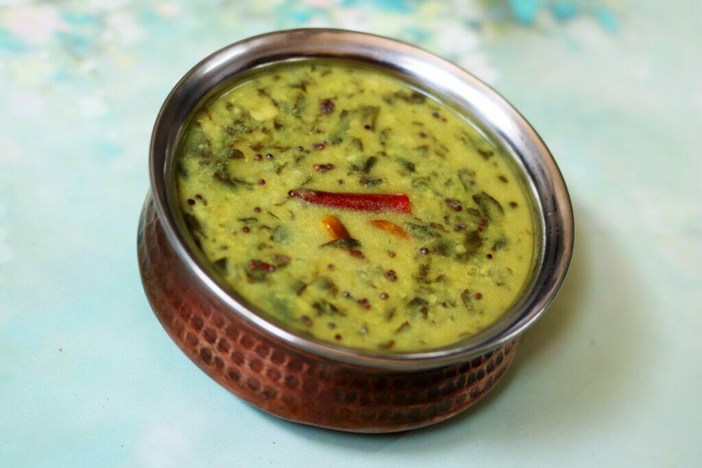 Gongur Pappu, the finger-licking good tangy lentils with red sorrel from Andhra. Also called Ambadi Dal, it is eaten with rice.