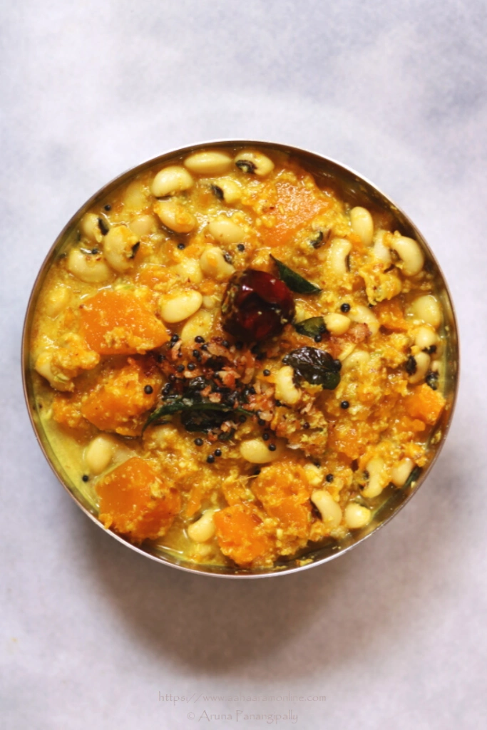 Mathanga Erissery is a traditional dish from Kerala. This Pumpkin and Black Eyed Peas in a Coconut Gravy is a part of the famous festive meals called Onam Sadya and Vishu Sadya. This is a gluten-free, vegan dish with no onion  and no garlic.