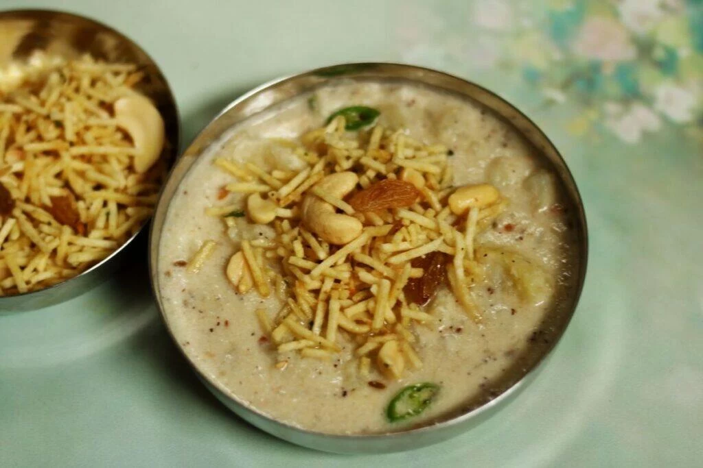 A bowl of Farali Misal with made by cooking boiled potato in a coconut-peanut gravy