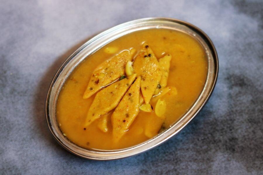 Dal Dhokli : Spiced wheat flour slices cooked in a thin, sweet, tangy dal. 