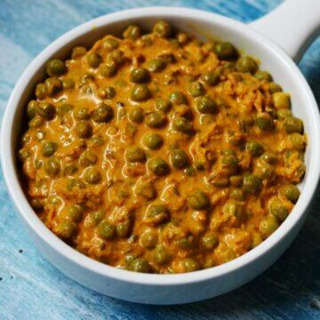 Gluten-free, vegetarian Haldi ki Sabzi made with grated turmeric root and fresh peas from Rajasthan.