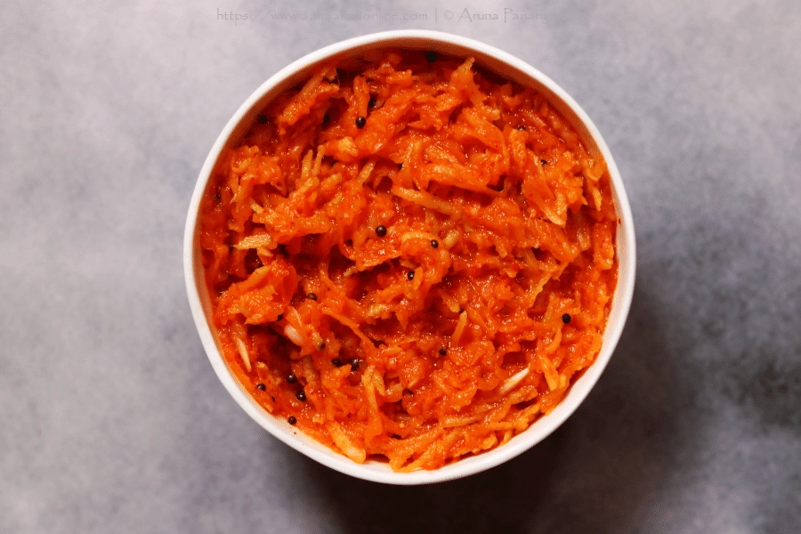 Kanda Kairi: A grated raw mango and onion chutney that is spicy and tangy.