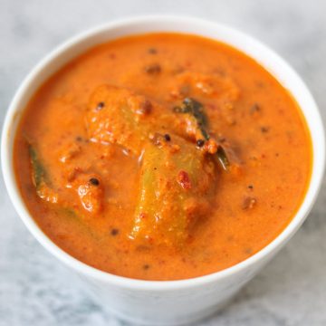 Amlechi Uddamethi is a traditional Raw Mango Curry in a coconut gravy tempered with Udad Dal and Methi.