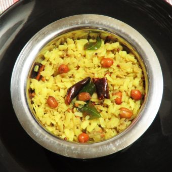 Atukula Pulihora is the traditional tamarind rice with beaten rice or poha
