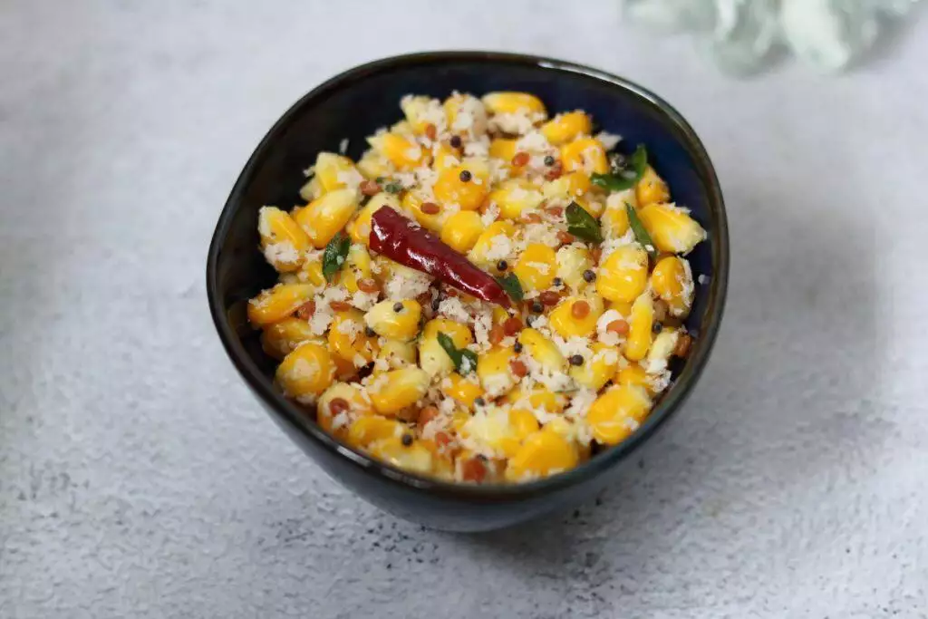 Sweet Corn Sundal, a simple snack with boiled corn kernels and coconut. 