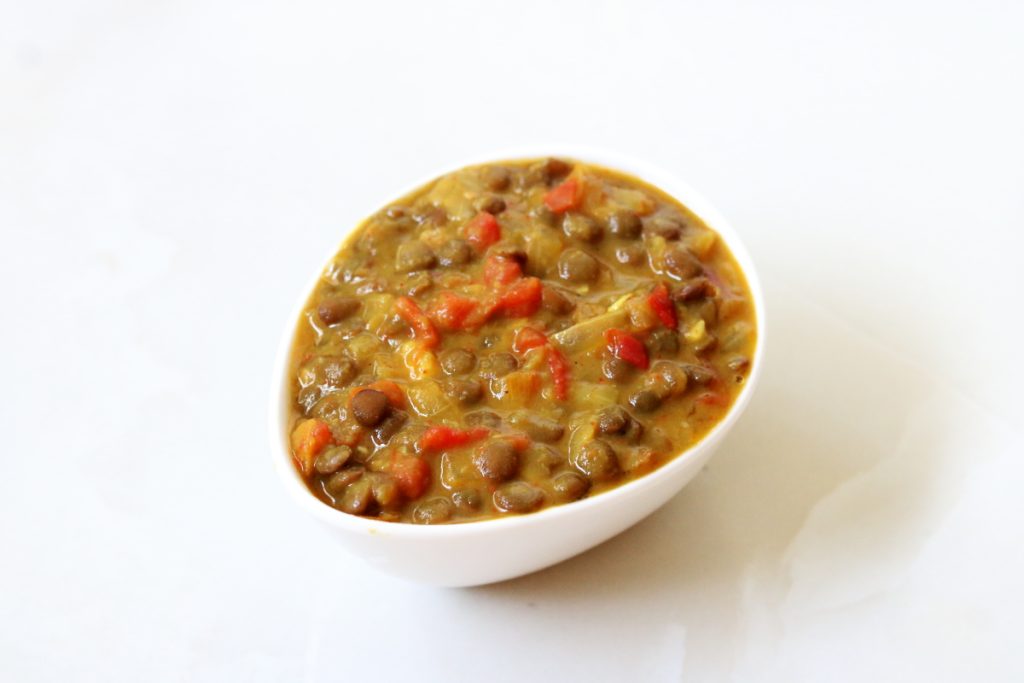 Masoor Dal or Brown lentils cooked in a tomato onion gravy flavoured with ginger, garlic, and red chilli powder.