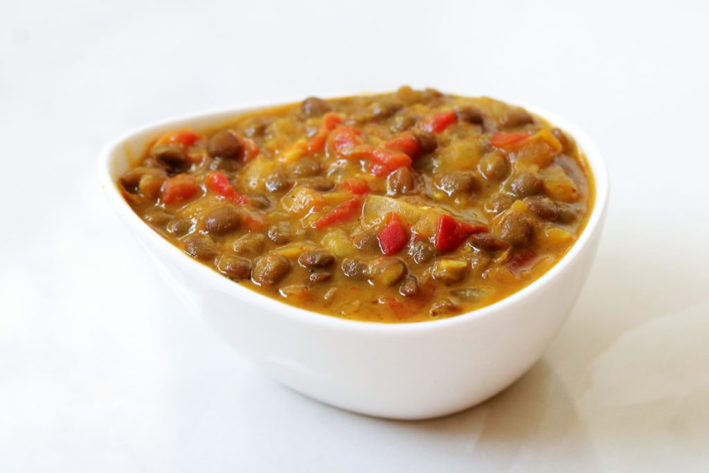 Masoor Dal or brown lentils cooked in onion and tomato mix flavoured with chili powder and garam masala.