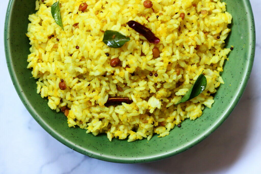 Tangy and delicious Usirikaya Annam or Nellikai Sadam is a rice dish made with the Indian Gooseberry or Amla.
