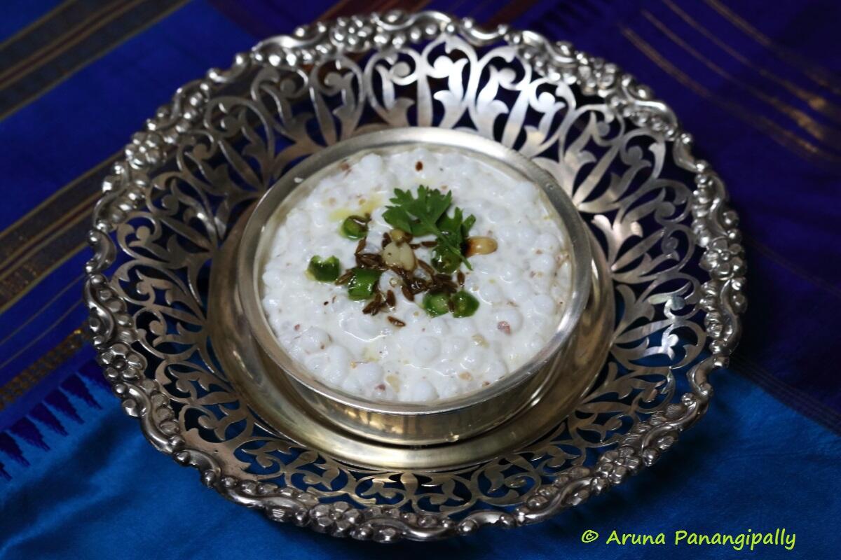 Dahi Sabudana | Vrat ka Khana/Upvas Recipe from Maharashtra A bowl of sabudana soaked in dahi and seasoned with roasted peanut powder, green chillies and cumin
