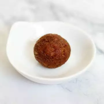 Coconut Laddu with Jaggery; called Kobbari Louz in Andhra & Telangana and Narkel Naru in Bengal & Bangladesh