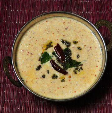 Hasi Sasive is a yogurt flavoured with ground mangalore cucumber, mustard, coconut, and red chillies. This is a recipe from the Udupi-Mangalore region of Karnataka.