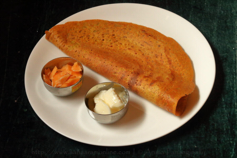 Paruppu Adai, a mixed dal dosa from Tamil Nadu, served with butter and jaggery