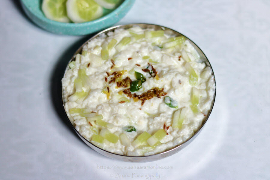 Gopalkala is beaten rice mixed with yogurt, cucumber, and grated coconut