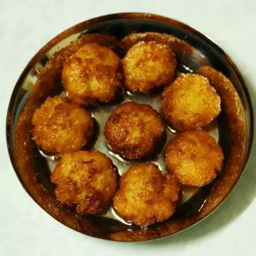 Dudhauri: Fried Milk and Rice Balls Soaked in Sugar Syrup
