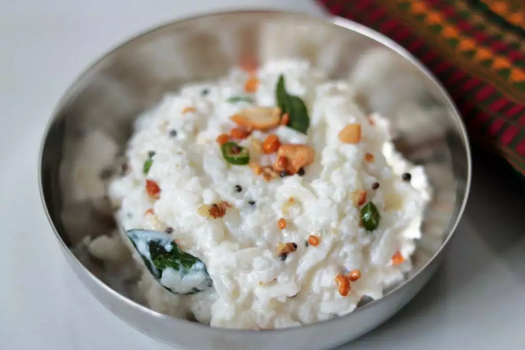 Mosaru Avalakki, also known as Dahi Poha in North & West India and Atukula Daddojanam in Andhra & Telangana