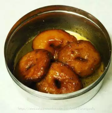 Bellam Garelu (also known as Pakam Garelu) are udad dal vadas soaked in jaggery syrup.