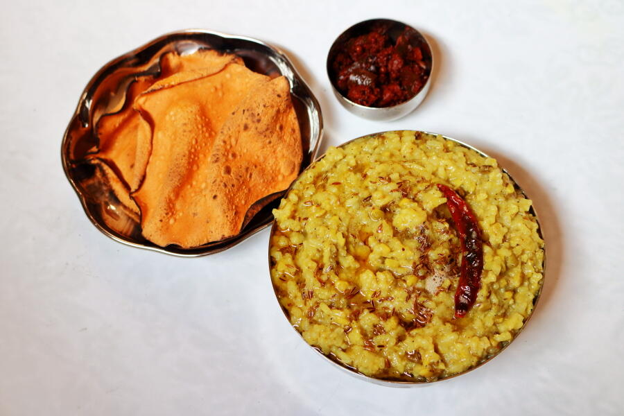 Maharashtrian Style Khichdi served with papad and achar