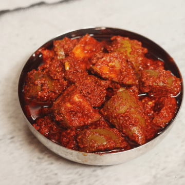 Avakai is the famous Andhra Mango Pickle flavoured with mustard and chilli powders.
