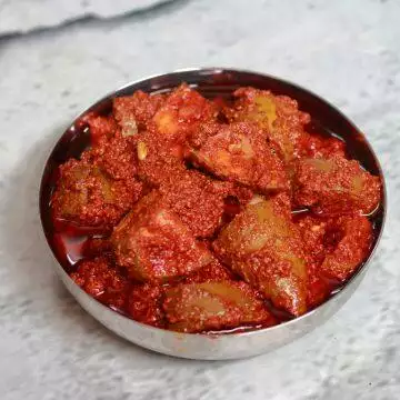 Avakai or Avakaya is the famous tangy and spicy Mango Pickle eaten with rice.