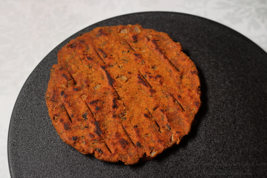 Thalipeeth: A thick, spiced, multigrain  roti from Maharashtra