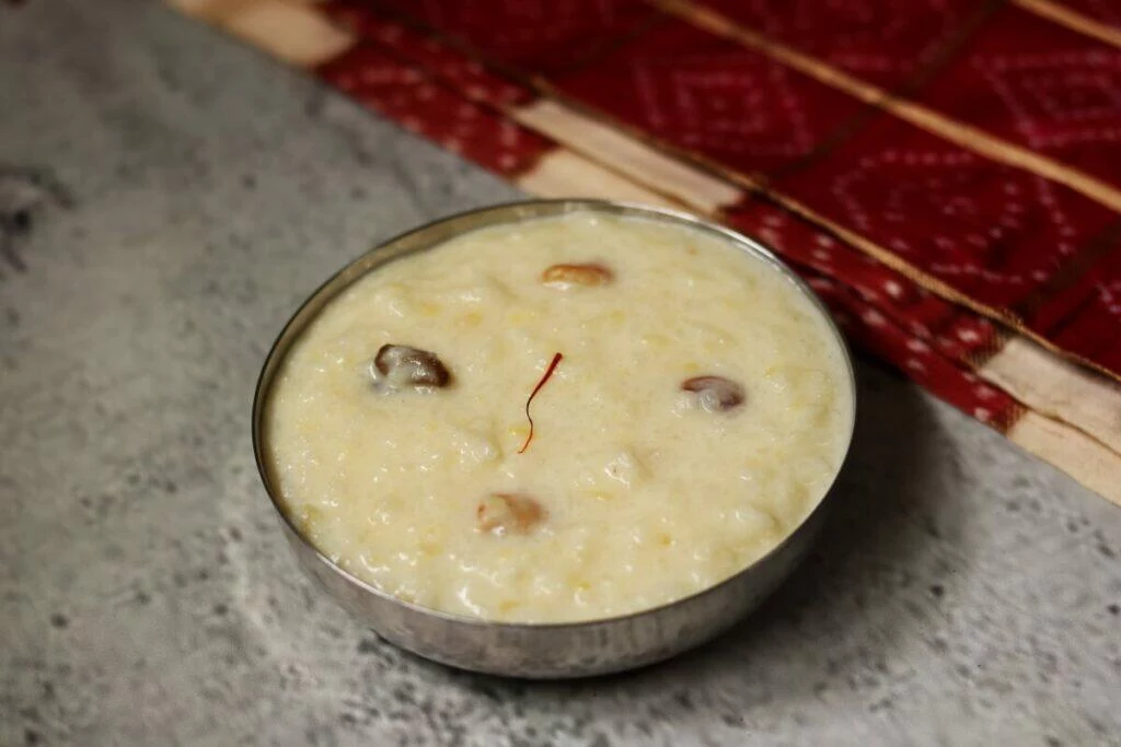 Kalkandu Pongal or Patika Bellam Pongali is a delicious and rich sweet from Tamil Nadu made with rice, moong dal, rock sugar, and milk.
