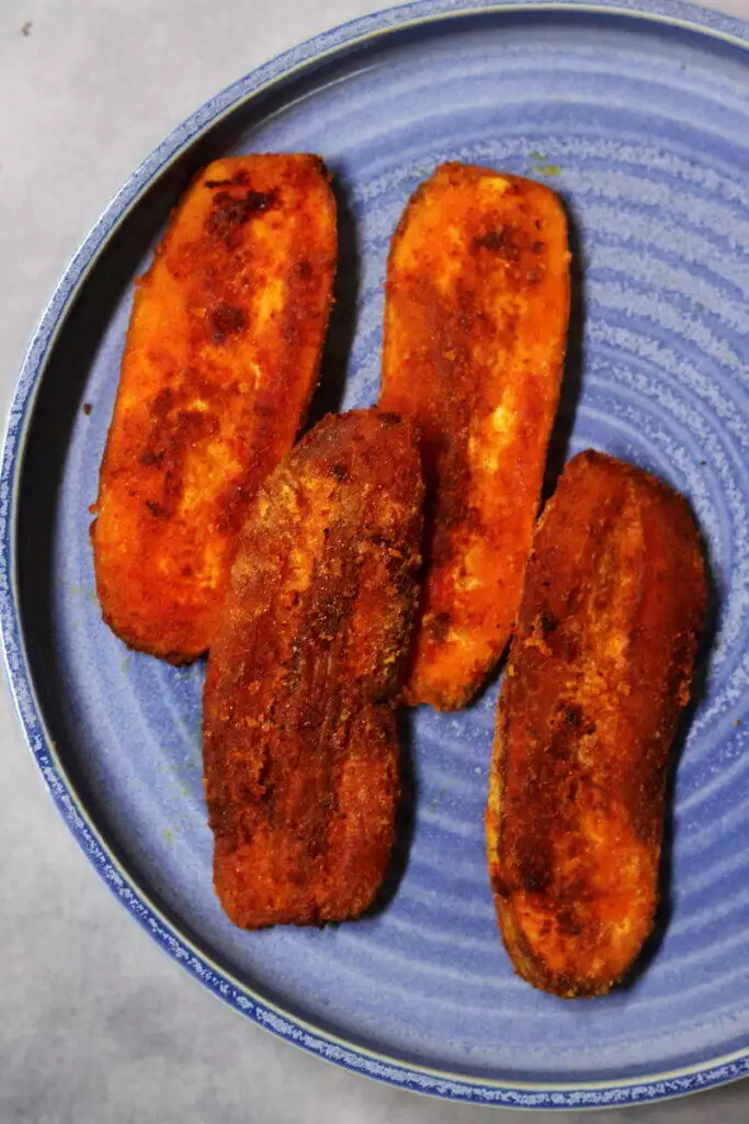 Crispy, crunchy, spicy Kelyache Kaap or pan-fried Raw Banana Slices from Maharashtra