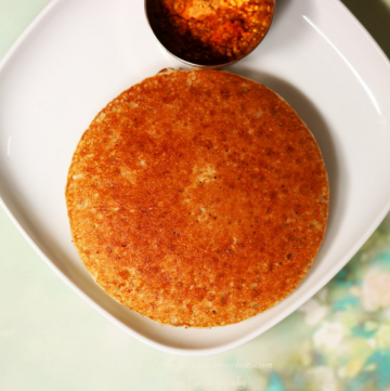 Bun Dosa is a thick and soft pancake made in a kadhai or wok with batter of a rice and beaten rice flakes.