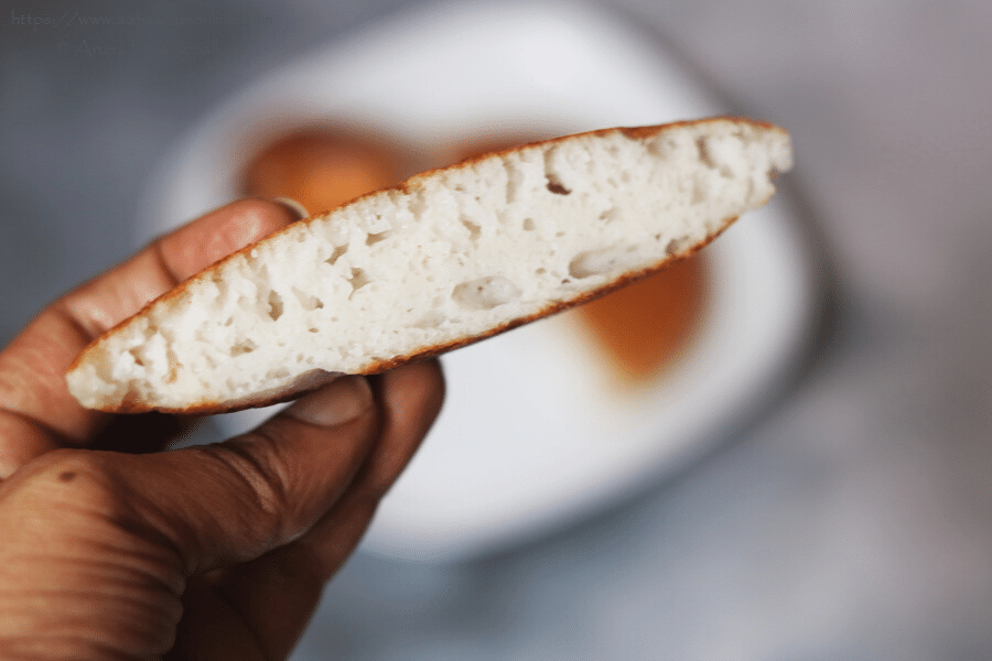 Inside of a Bun Dosa The soft and fluffy inside of a Bun Dosa, a thick pancake with rice and poha (beaten rice)