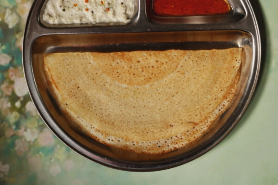 Unlike traditional dosas, Rice and Poha Dosa uses no lentils at all. This crisp and thin Indian crepe is the perfect light breakfast for people with kidney problems.