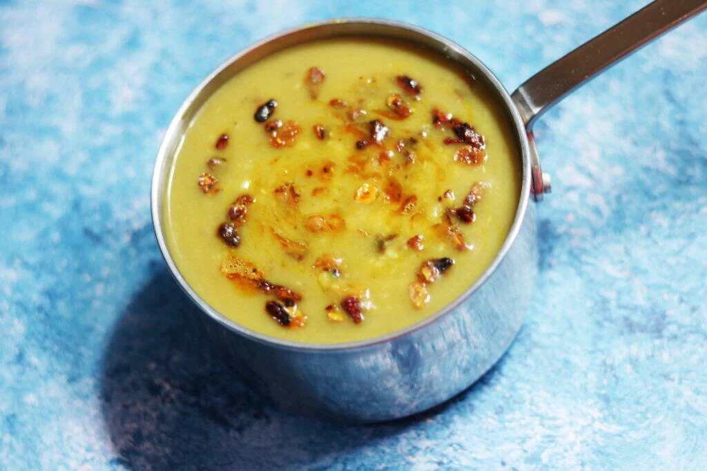 Boiled Moong Dal with a tempering of crushed garlic and pomegranate seeds. A low-sodium, low-potassium recipe suited for renal diet or kidney diet.