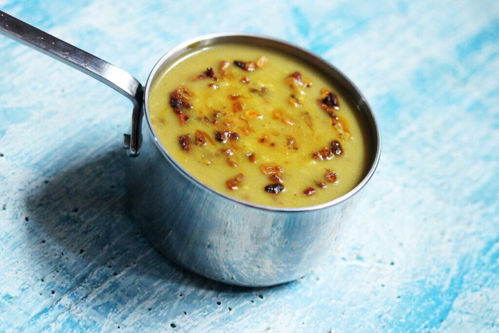 And easy-to-make, low-potassium renal diet recipe of moong dal with tempered with garlic and Anardana (dried pomegranate seeds)