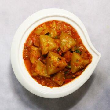A bowl of Tinde ki Sabzi or Punjabi Tinda Masala, a delicious curry with Apple Gourd