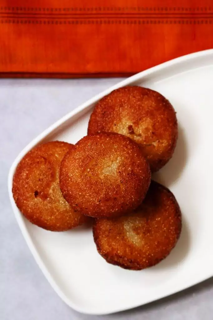 Andhra Rava Appalu or Sweet Suji Appam: Deep-fried discs of semolina halwa