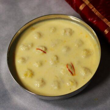 Sudha Sindhu, a Bengali sweet made by simmering almond paste and mava balls in saffron-flavoured milk