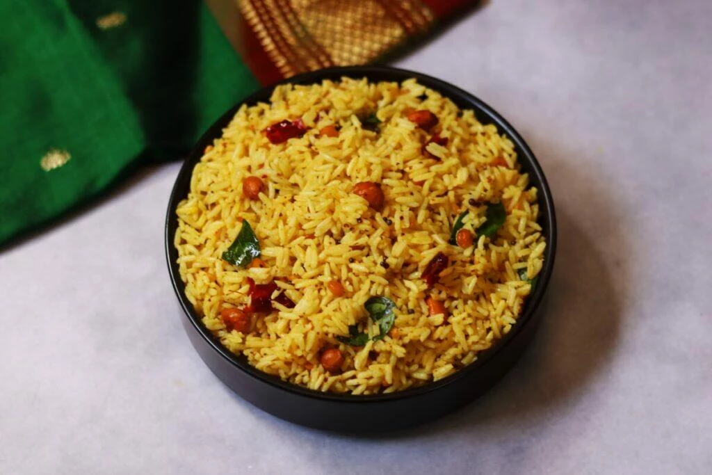 Andhra Ava Pindi Pulihora or the tamarind rice spiced up with some mustard paste