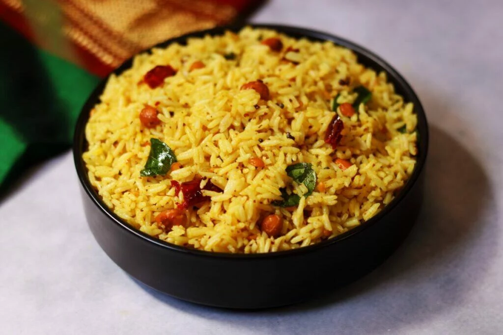 Ava Pulihora is an Andhra specialty where mustard paste is added to the classic tamarind rice