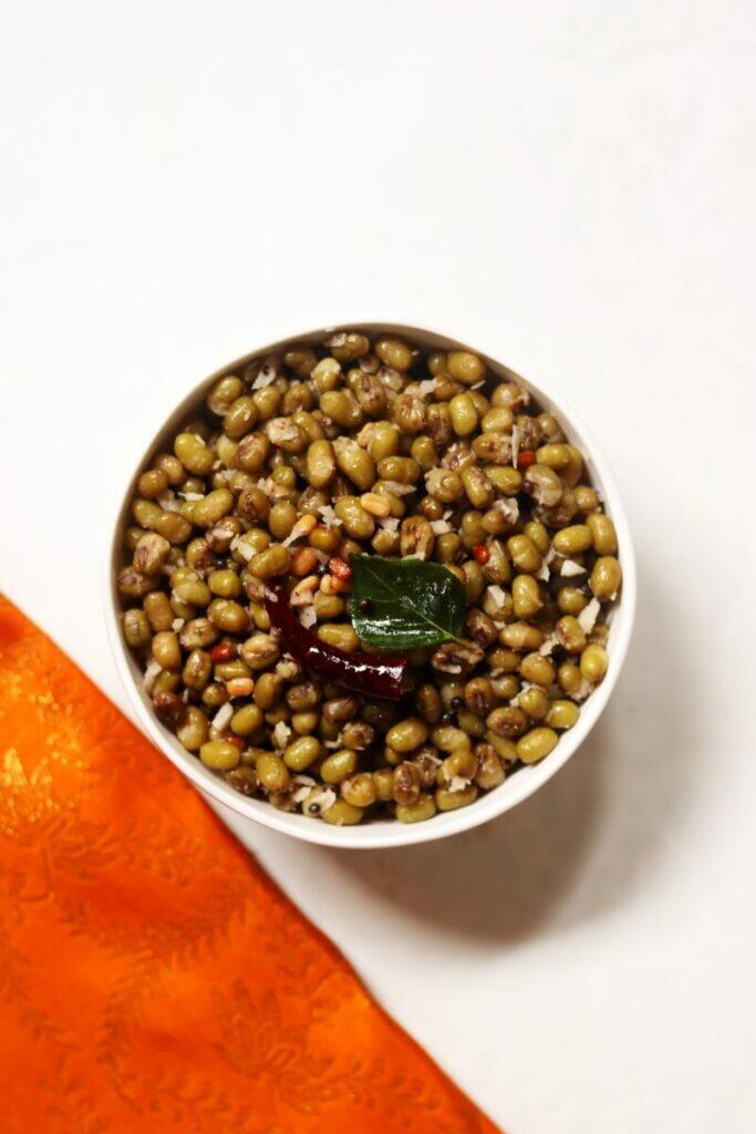 Pachai Payaru Sundal A Bowl of Pachai Payaru Sundal: Boiled Green Moong with Tempering and Coconut