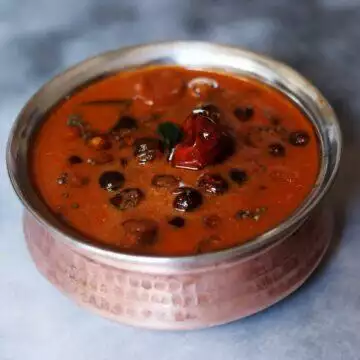 Sundakkai Vatha Kuzhambu, turkey berries in a tamarind gravy, made in the Tamil Brahmin style with no onions or tomatoes.