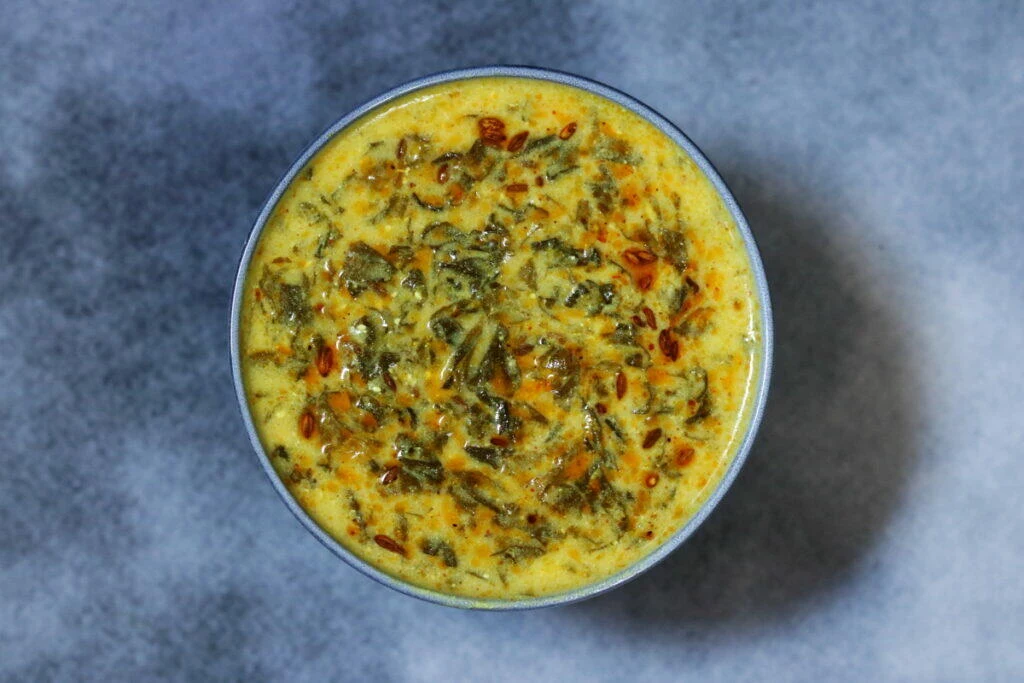 Methi Kadhi is the ultimate comfort dish when relished with rice and some papad.