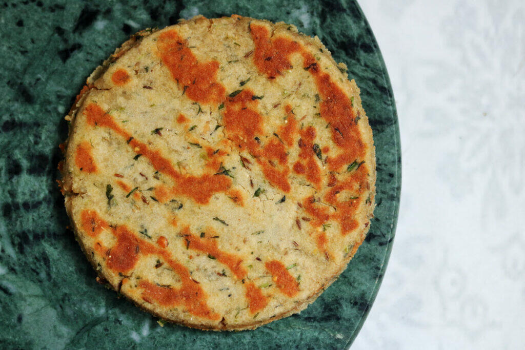 Rajgira Thalipeeth is a gluten-free Amaranth Flour Pancake served on Ekadashi.