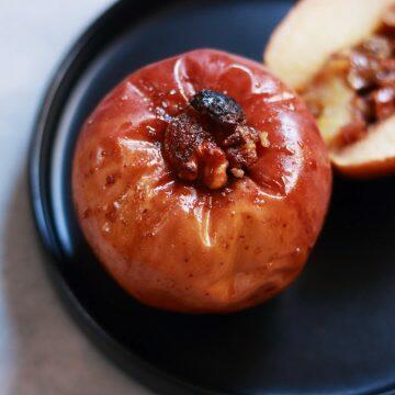 Easy to make and delicious Baked Apples stuffed with crunchy walnuts, sweet raisins and brown sugar, and warming cinnamon.