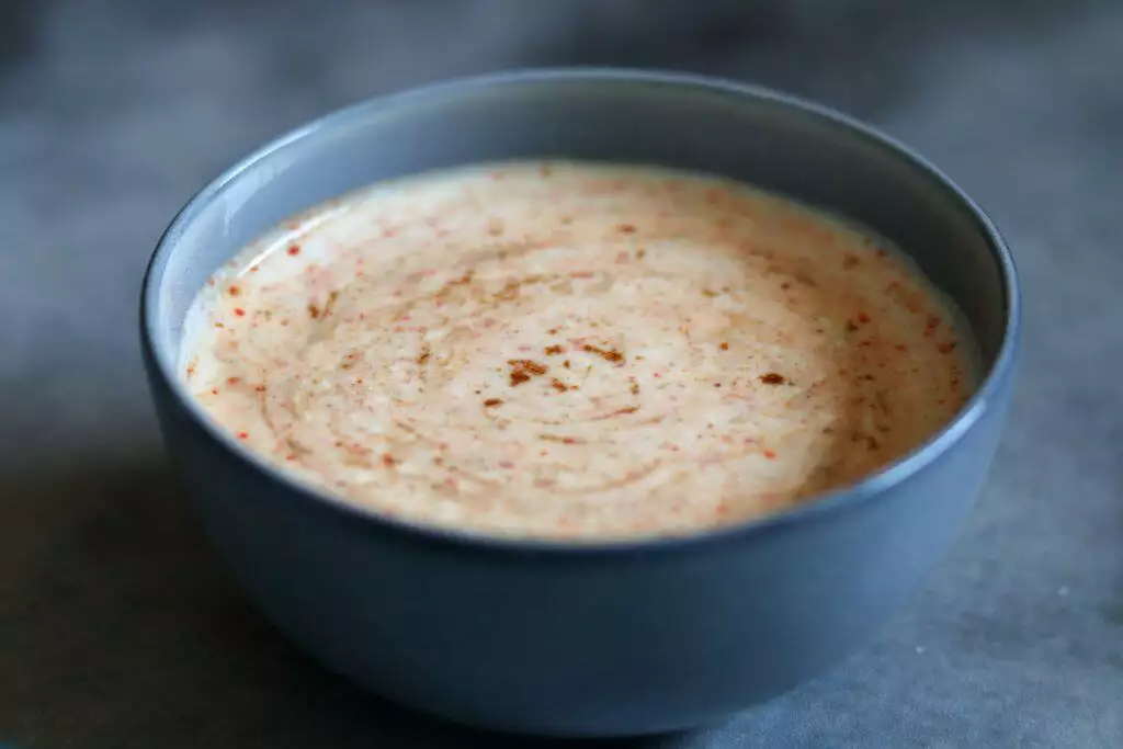 Hyderaadi Burani Raita, a mellow garlic-flavoured yogurt, served with Biryani or Qabooli.