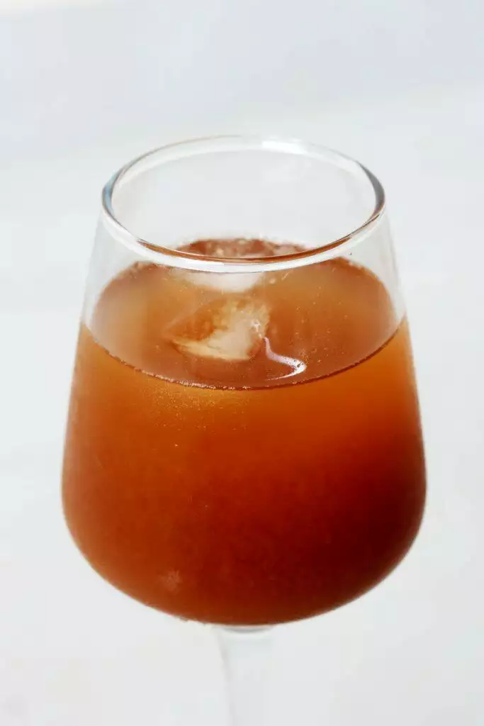 Agua de Tamarindo or Tamarind Agua Fresca is a Mexican drink made with tamarind pulp, sugar and water.