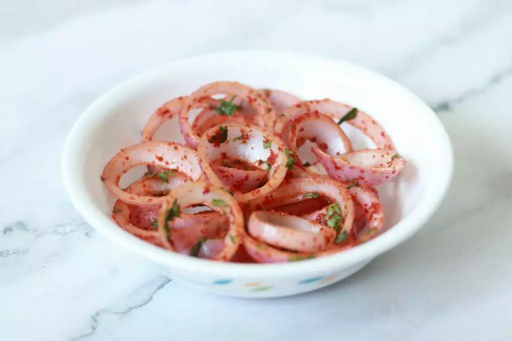 Laccha Pyaz, also sometimes called Laccha Onion, is a much-loved Onion Salad in North India 