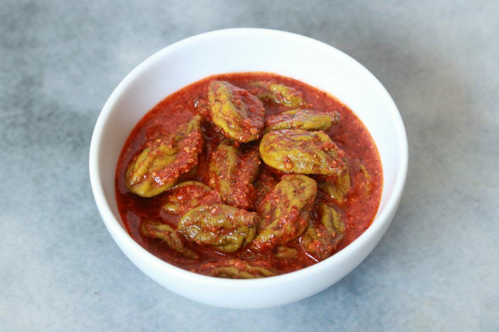 Maavadu | Vadu Manga | Baby Mango Pickle Without Oil Known as Maavadu or Vadu Manga Oorugai, this is a spicy and tangy baby mango pickle with no oil