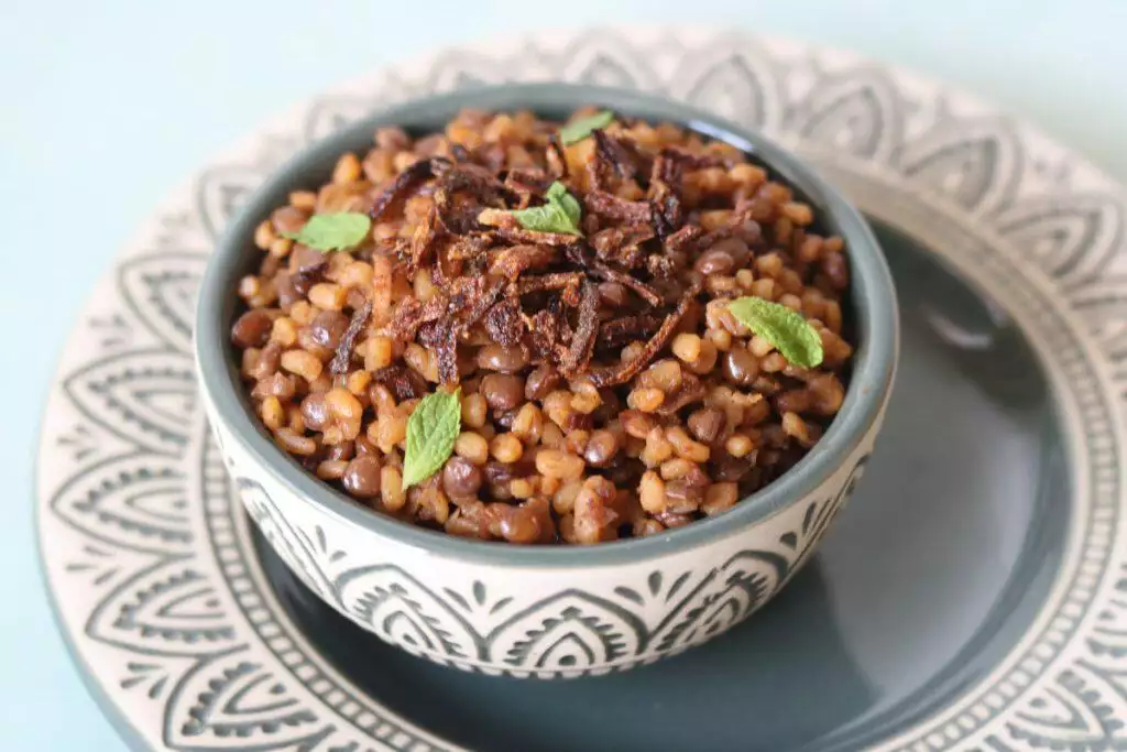 Lebanese Mujadara made with Brown Lentils, Bulgur, and Caramalized Onions.