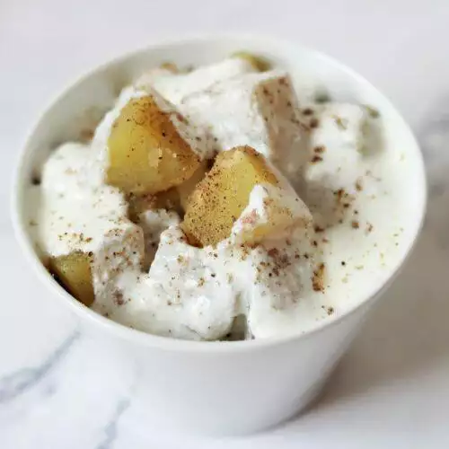 Sweet Potato Chaat: Boiled, peeled & cubed sweet potato topped with dahi, sendha namak, and cumin powder