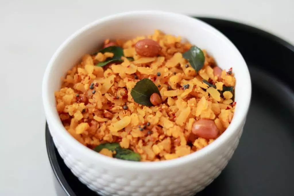 Udupi-style Huli Avalakki (also known as Puli Aval or Tamarind Poha)