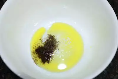 Mix olive oil, salt and pepper